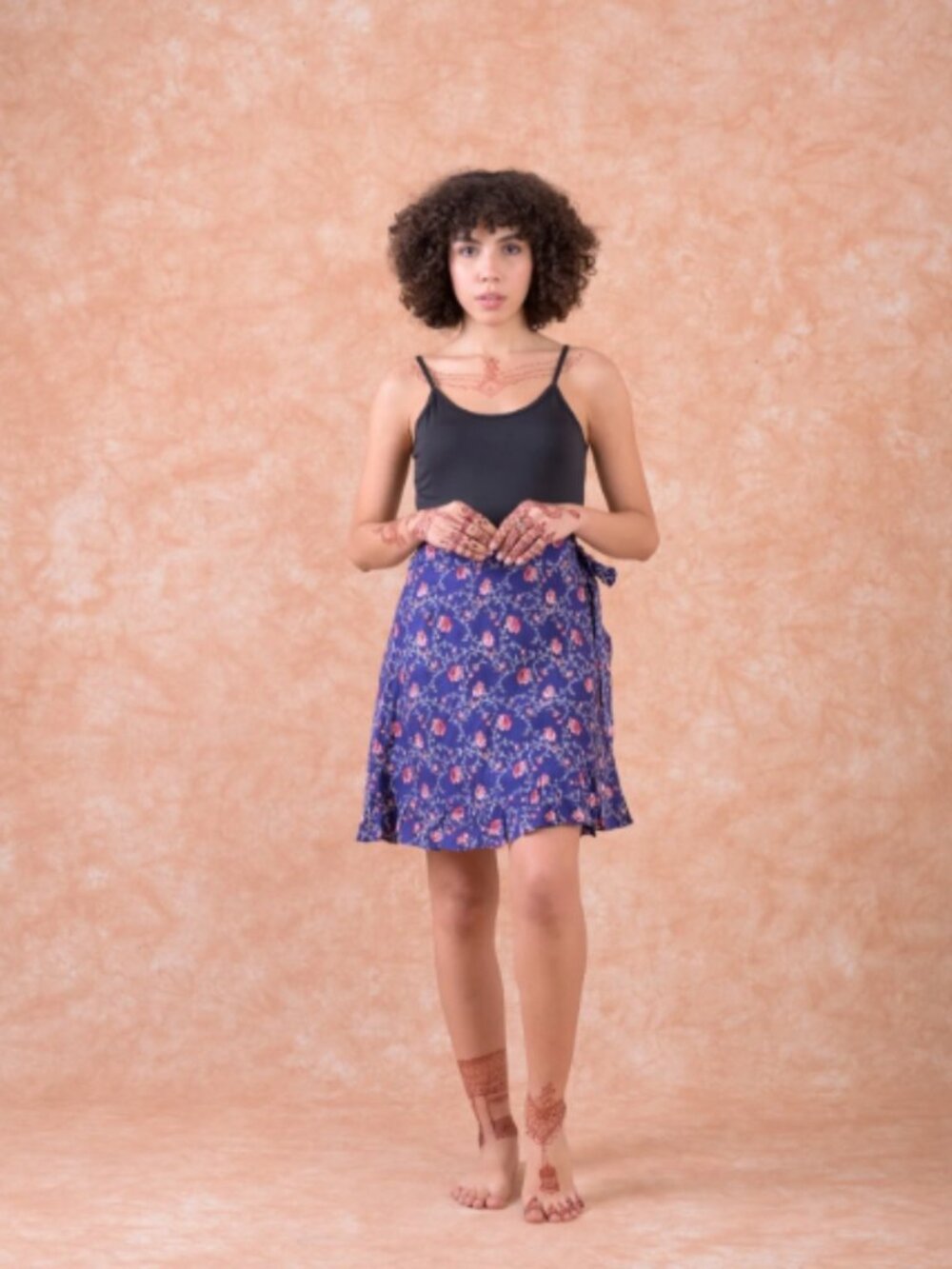 7.) Rhea Mini Wrap Skirt